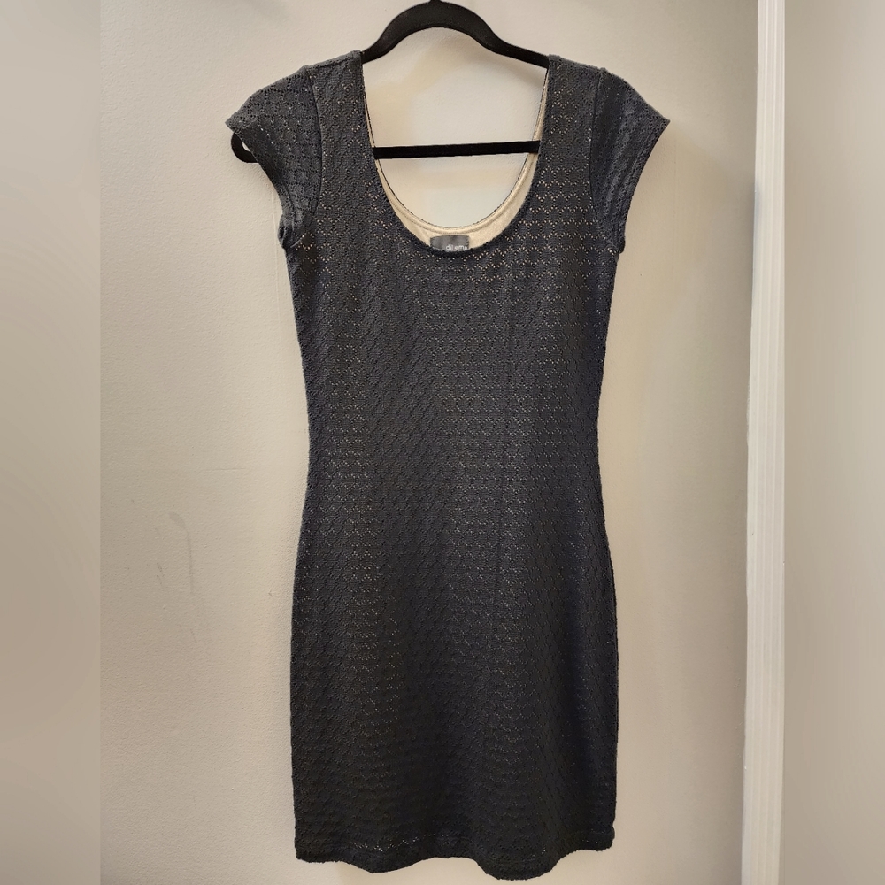 Black perforated nude lined dress. Size medium